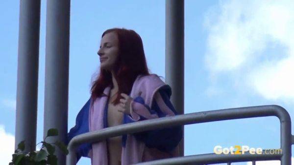 Watch this kinky redhead get a public surprise while peeing in the city - sexu.com on v0d.com