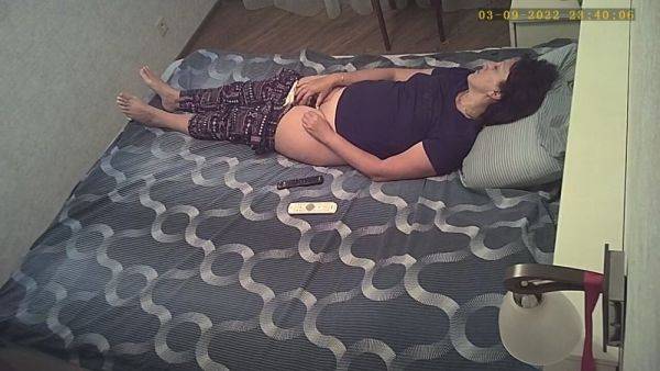 Slightly lowered her panties and jerks off her pussy without knowing about the hidden camera - hclips.com on v0d.com