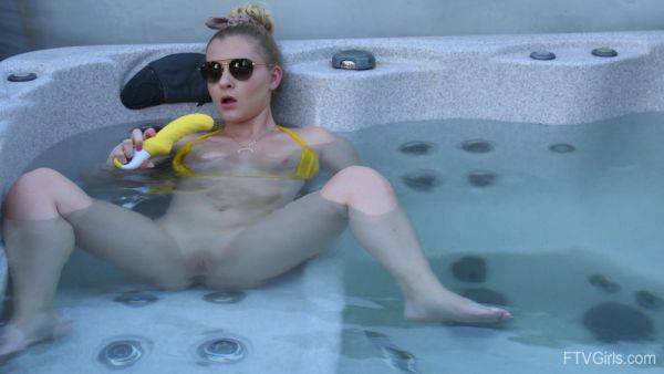 Sweet blonde inserts big dildo in her shaved pussy while in the pool - hellporno.com on v0d.com