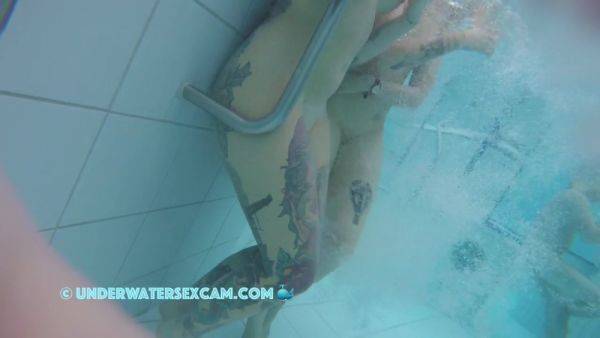 In This Underwater Video We See A Lot Of Piercings And Tattoos - hclips.com on v0d.com