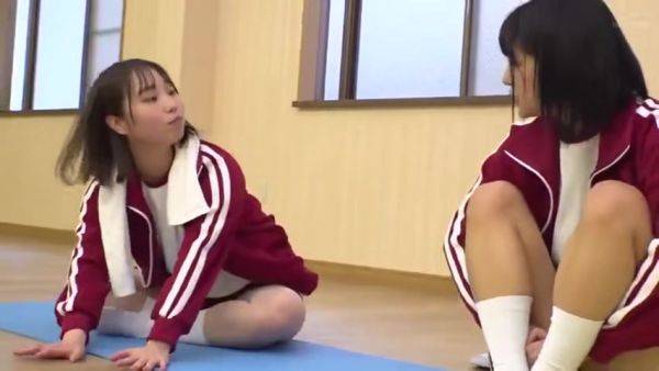 Two beautiful girls in gym clothes lay down a mat and rub and lick the cute breasts of their gymnastics friend - senzuri.tube on v0d.com