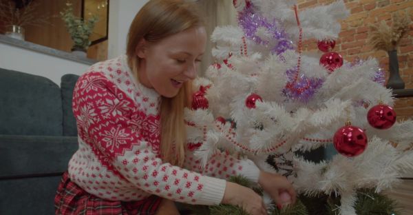 MILF in miniskirt rocks Santa hat while pleasuring herself with a festive dildo on the couch - alphaporno.com on v0d.com